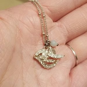 Fossil bird charm necklace